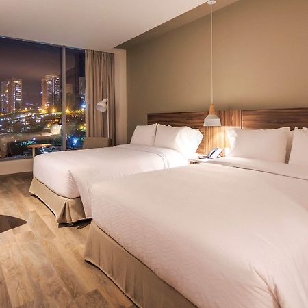 Novotel Medellin El Tesoro エクステリア 写真 A room at the hotel