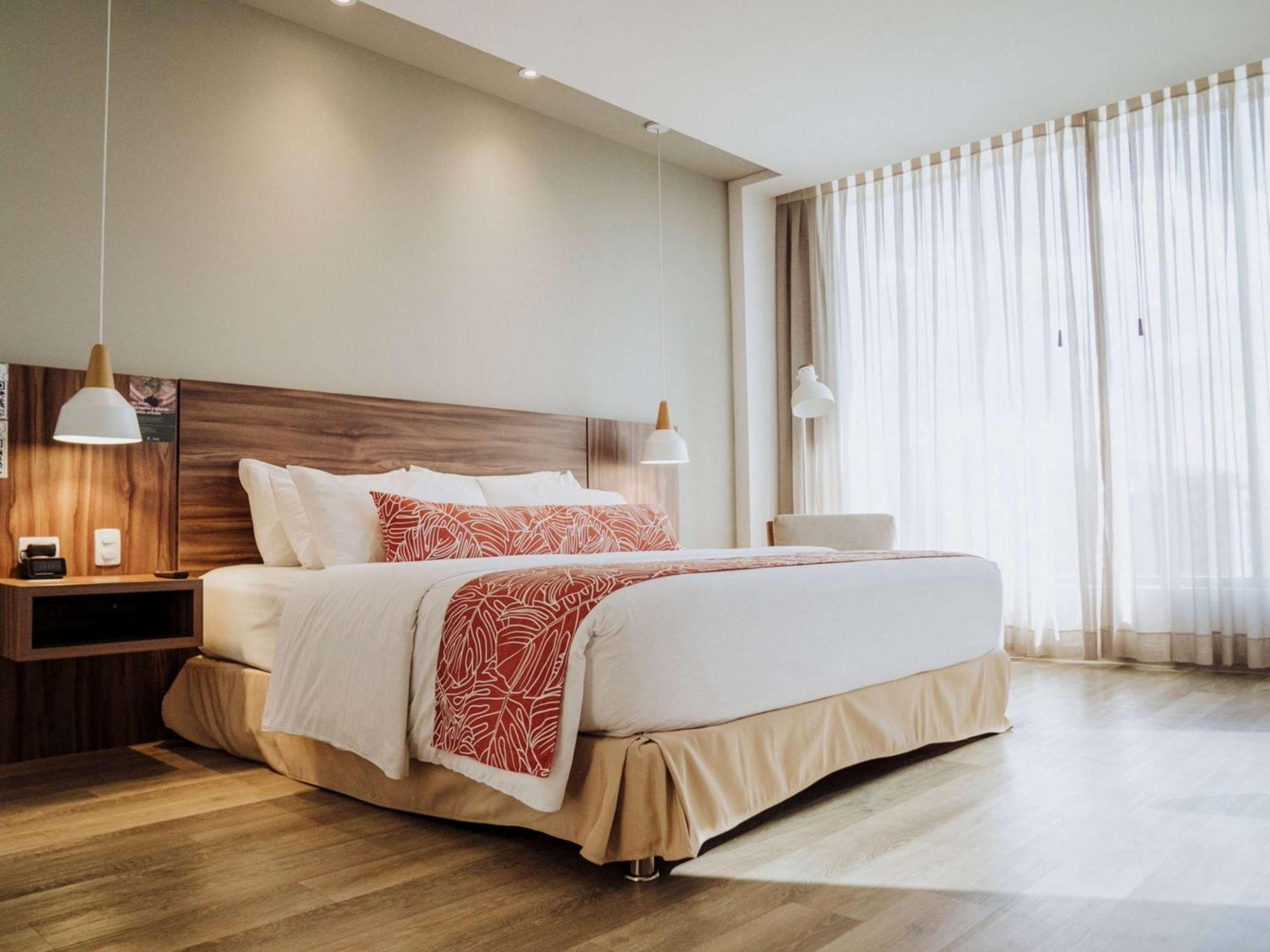 Novotel Medellin El Tesoro エクステリア 写真 A bedroom at the hotel